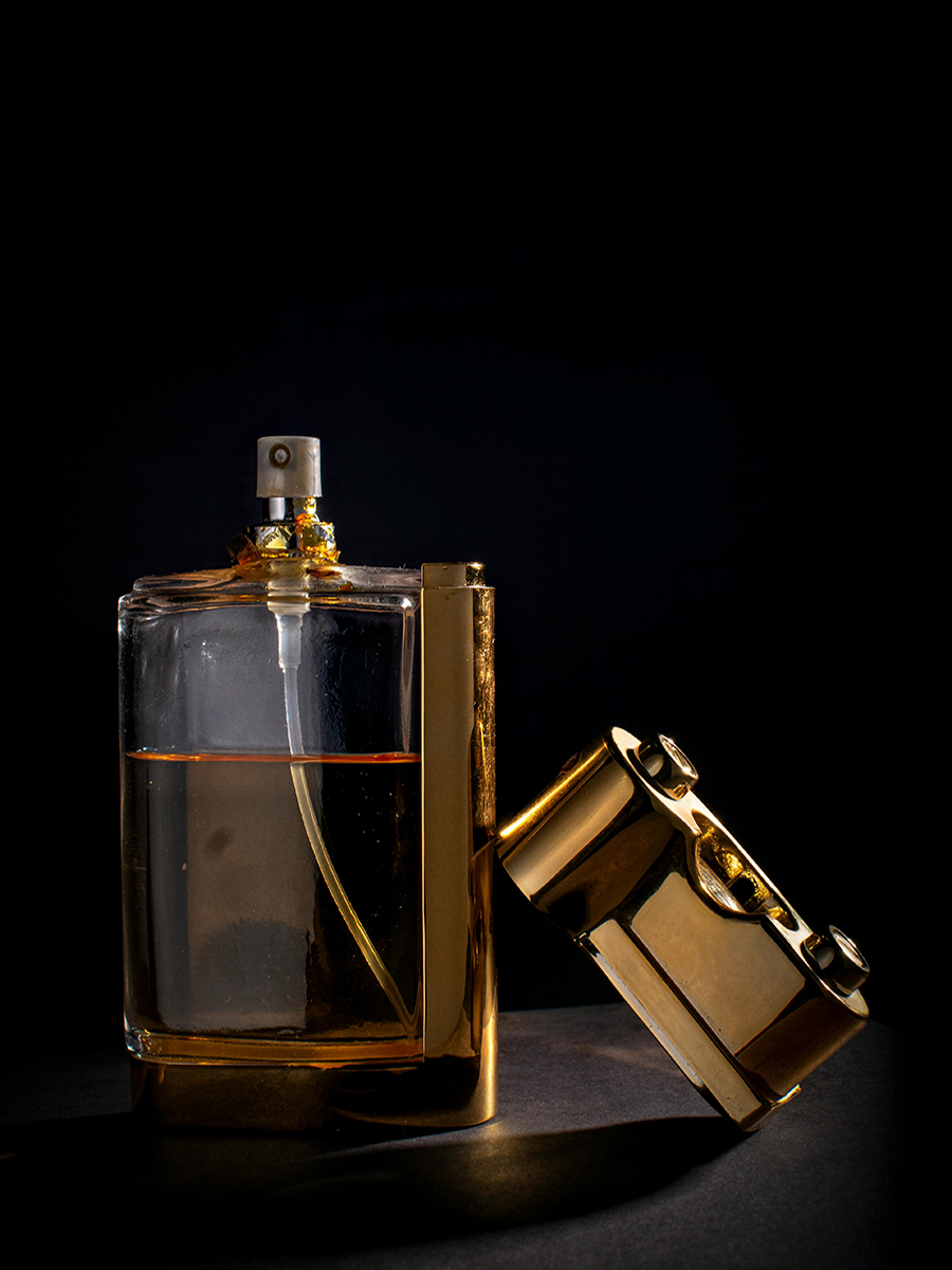 perfume bottle in  a dark background